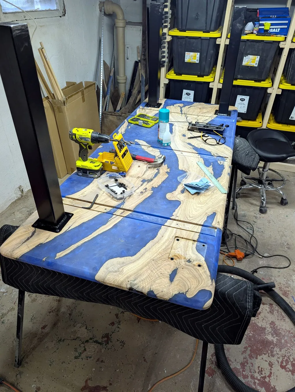 A table in progress in the workshop, mid-build with tools nearby